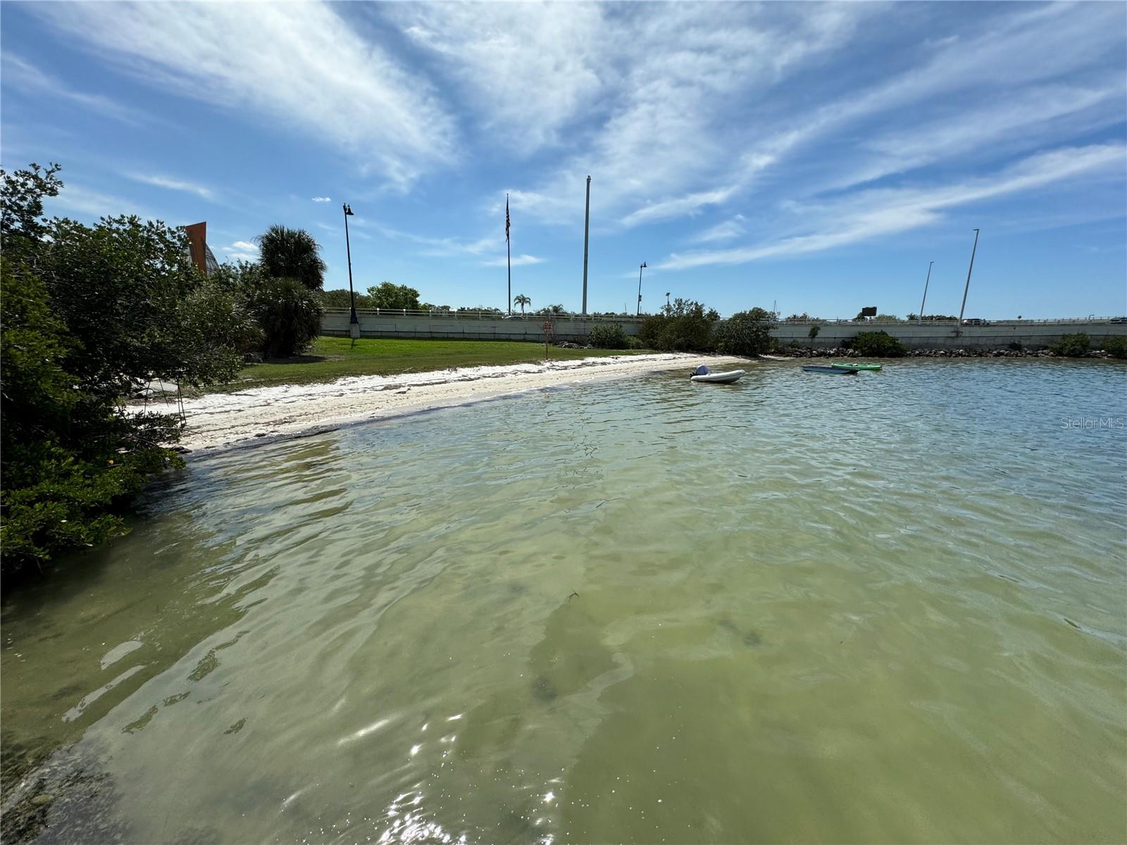 Small beach adjacent to property.