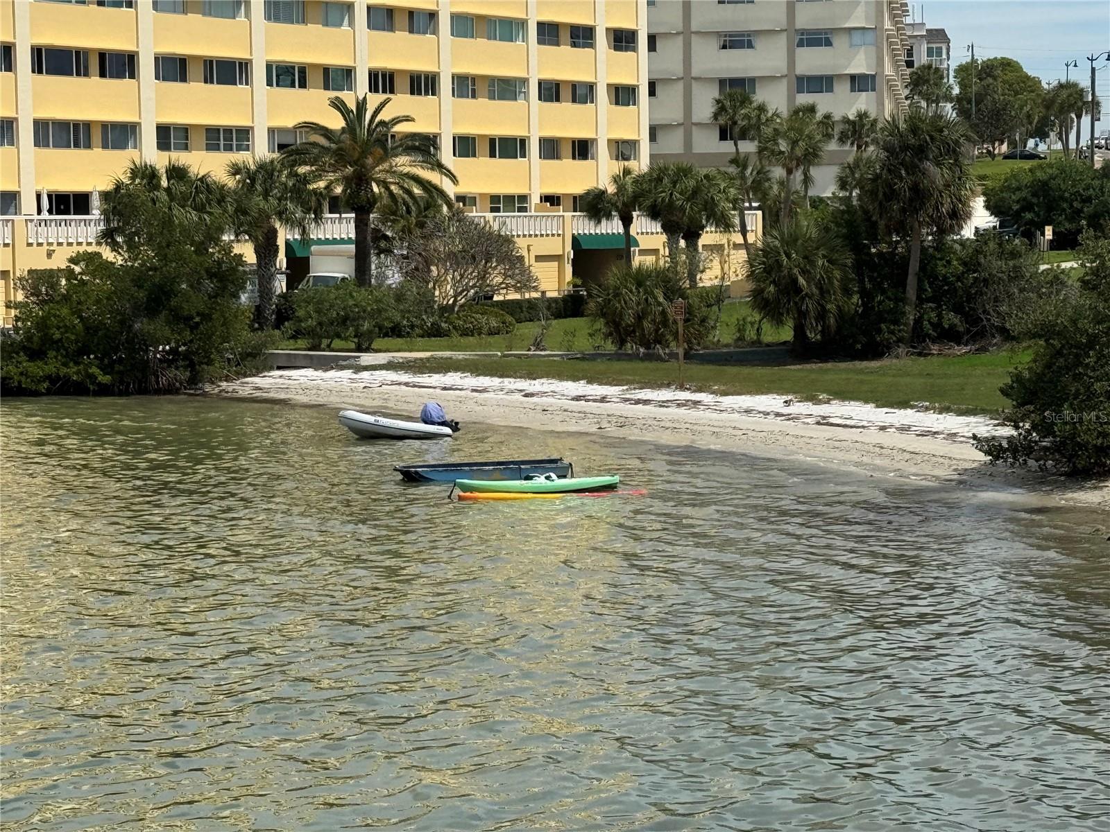 Small beach adjacent to property.