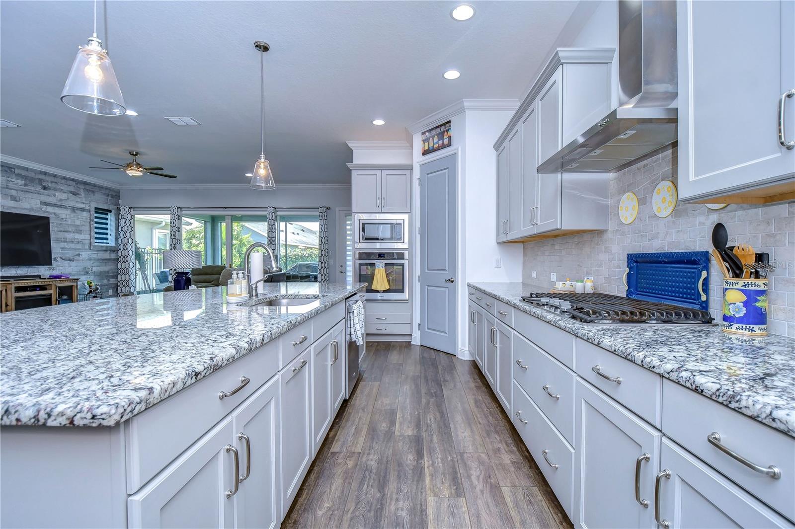 Granite counters, large center island, and built-in appliances!