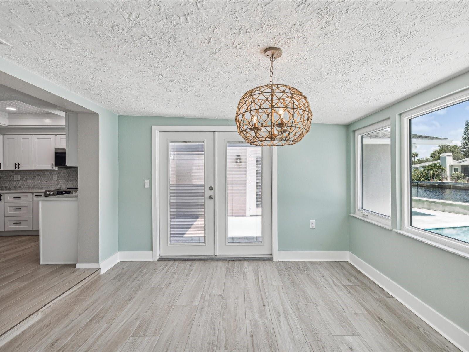 Dining Room with French doors to Courtyard and Backyard