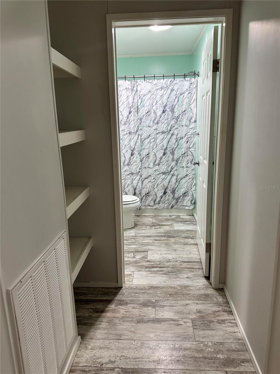 Guest bathroom linen area.