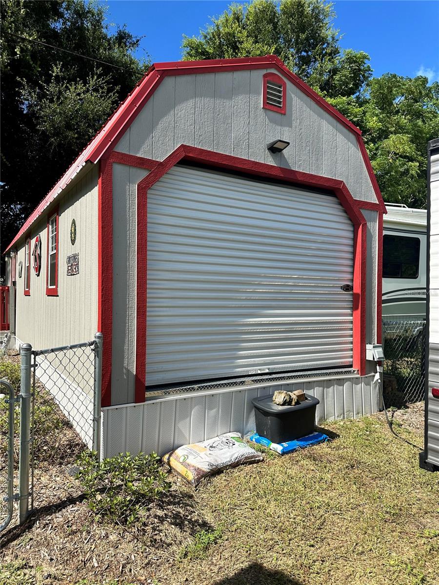 Large shed with garage door