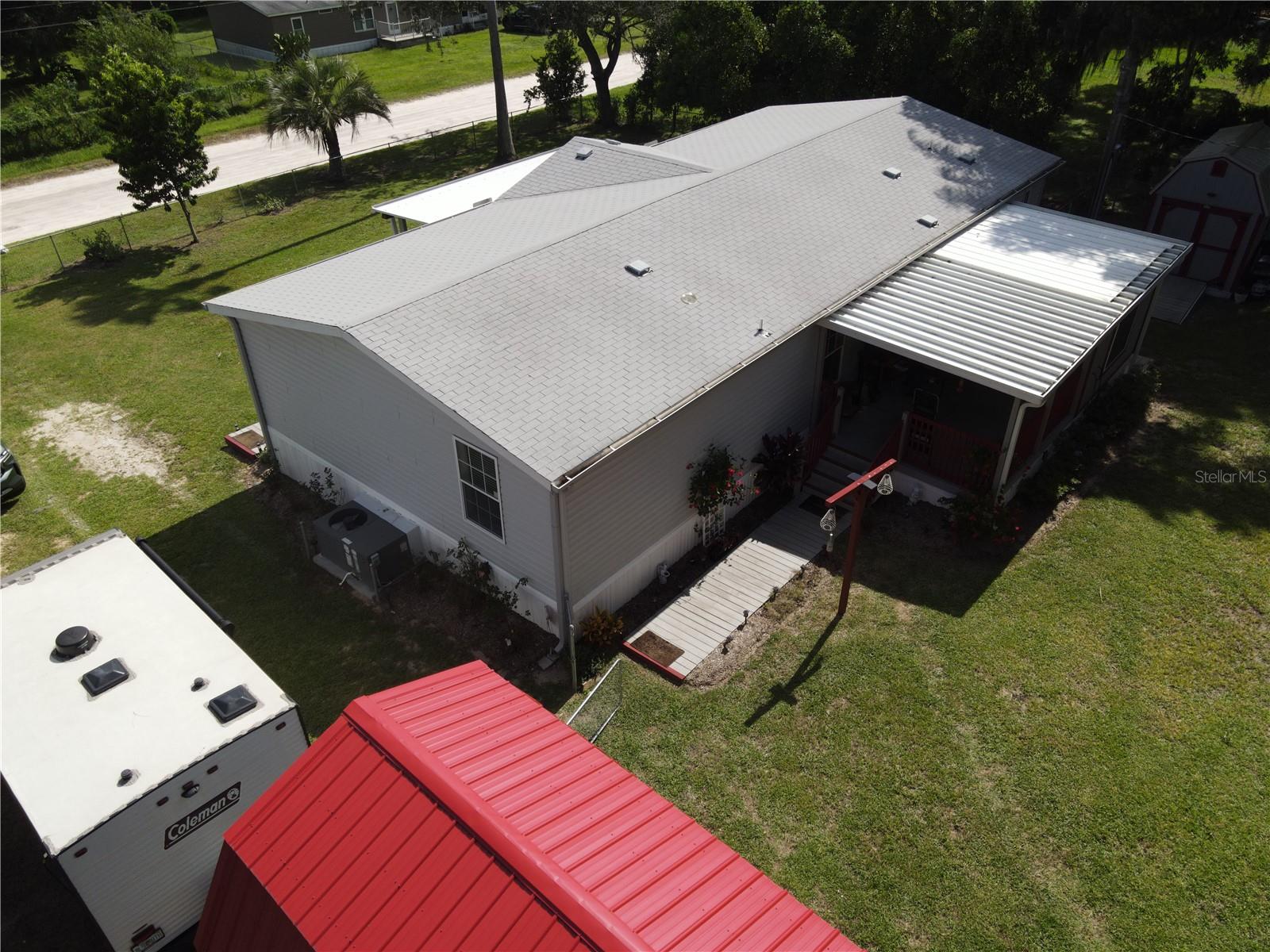 Drone Shot with Large shed red aluminum roof