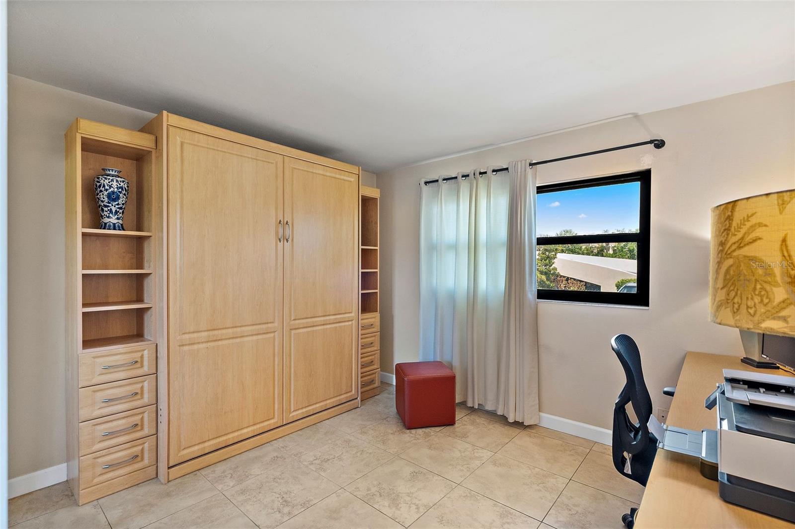 Guest room with queen size Murphy bed... perfect for a home office too.