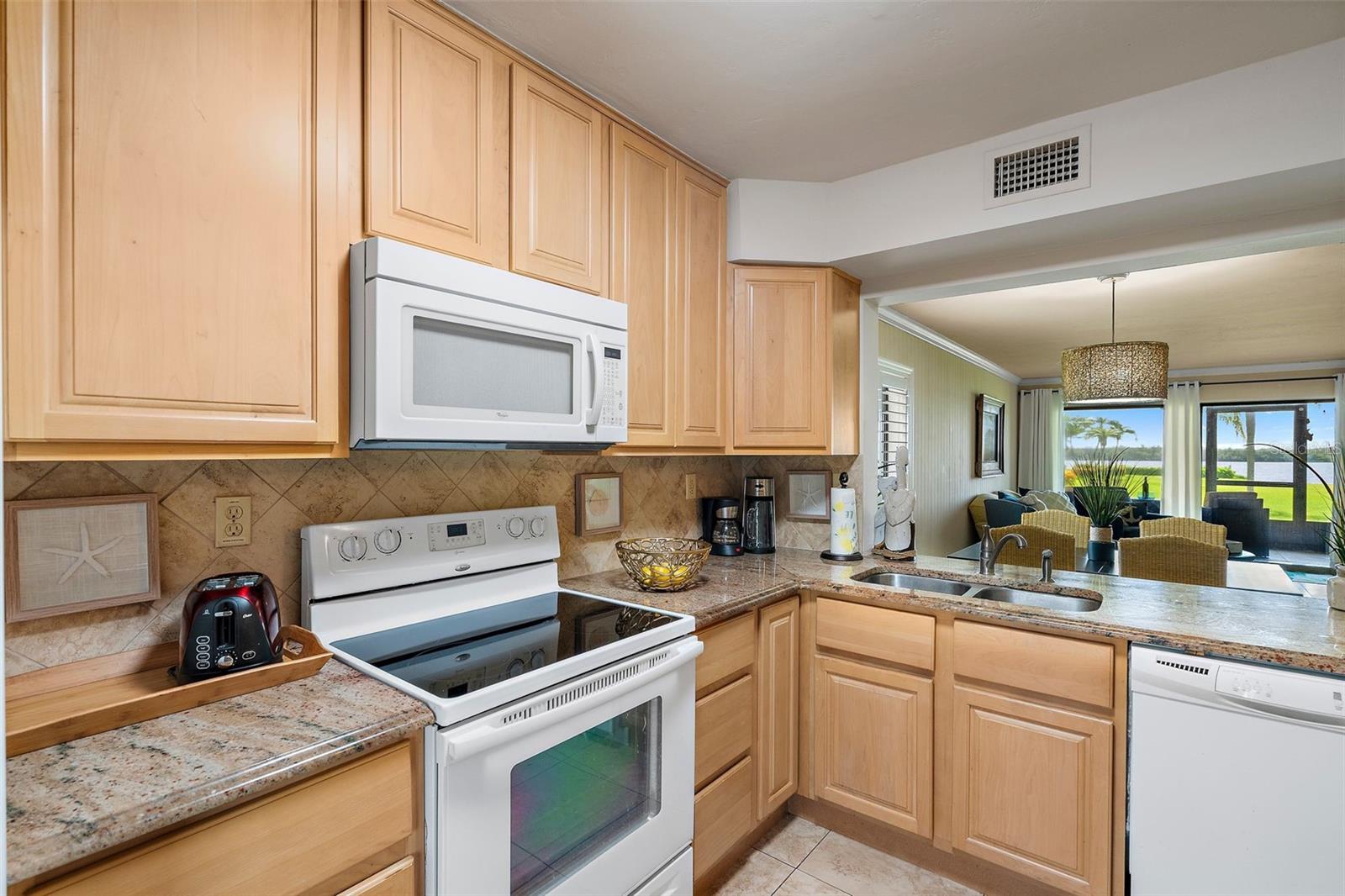 Opened up kitchen to maximize the water views.