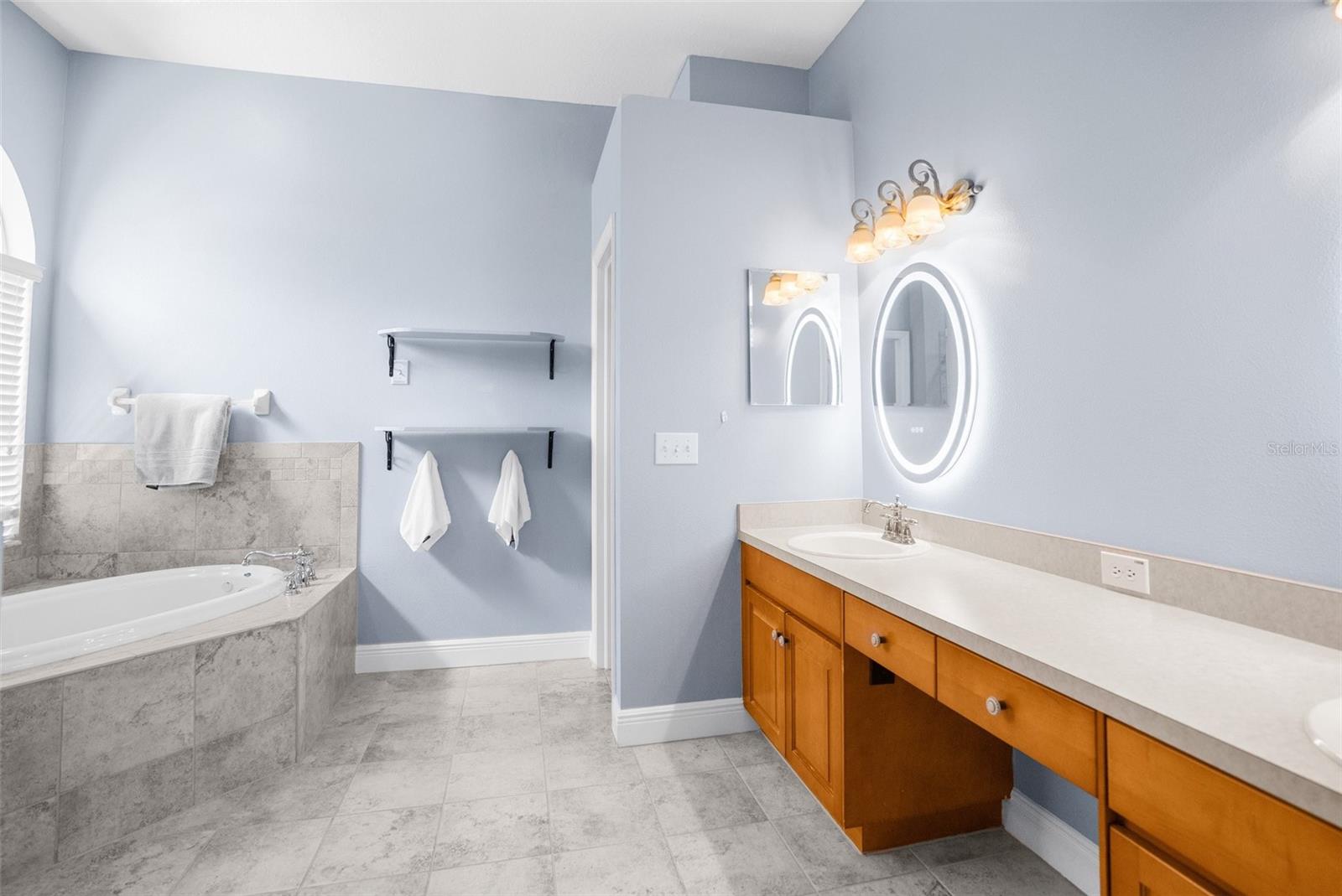 Primary Bathroom Double Vanity with Make Up Mirrors