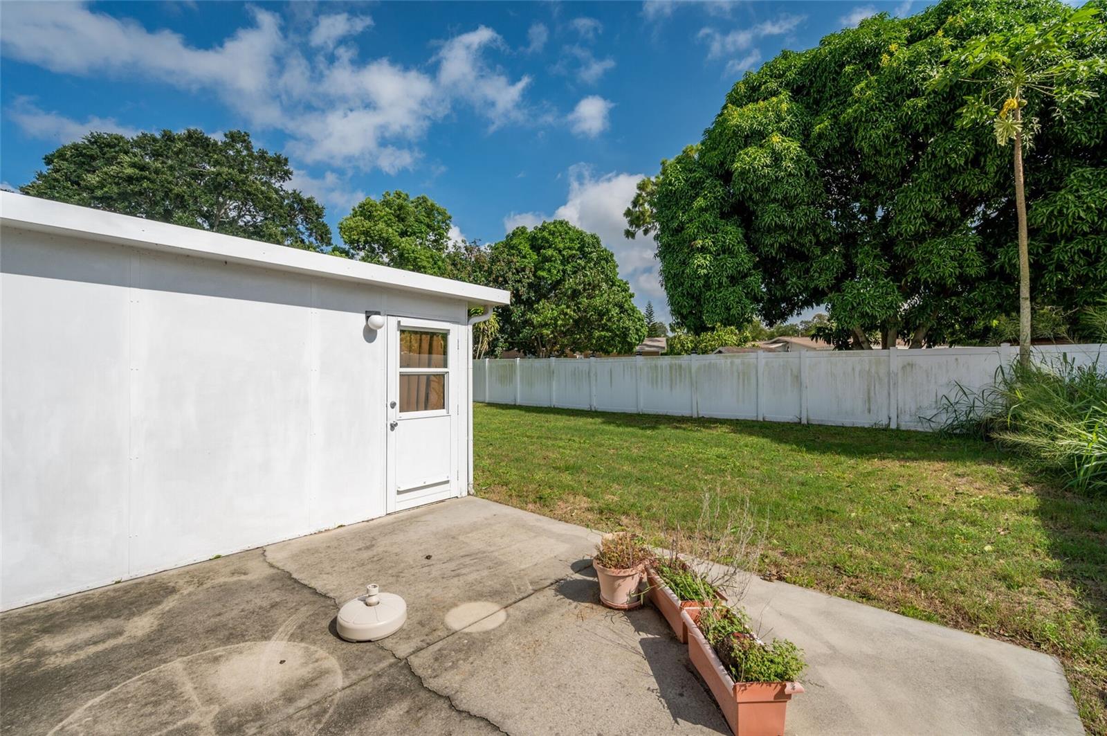 Concrete porch off florida room