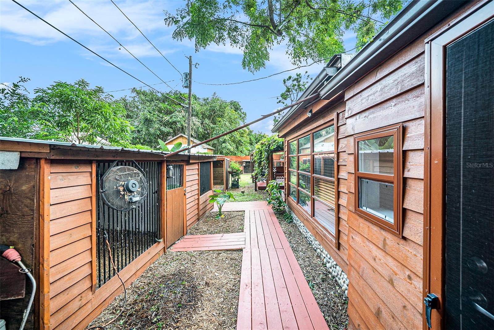 A spacious WORKSHOP with a metal roof offers additional space.