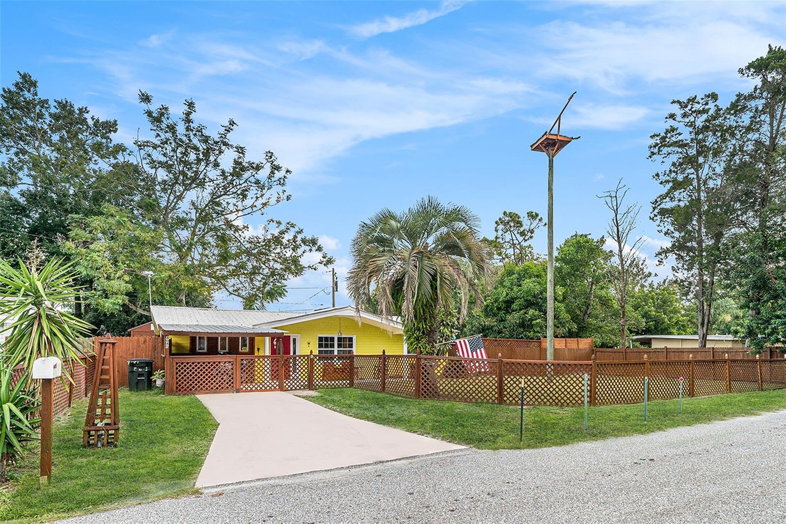 Spacious POOL home with a METAL ROOF situated on a quiet dead-end block, NO HOA, NO CDD fees, NO flood insurance, and LOW Taxes