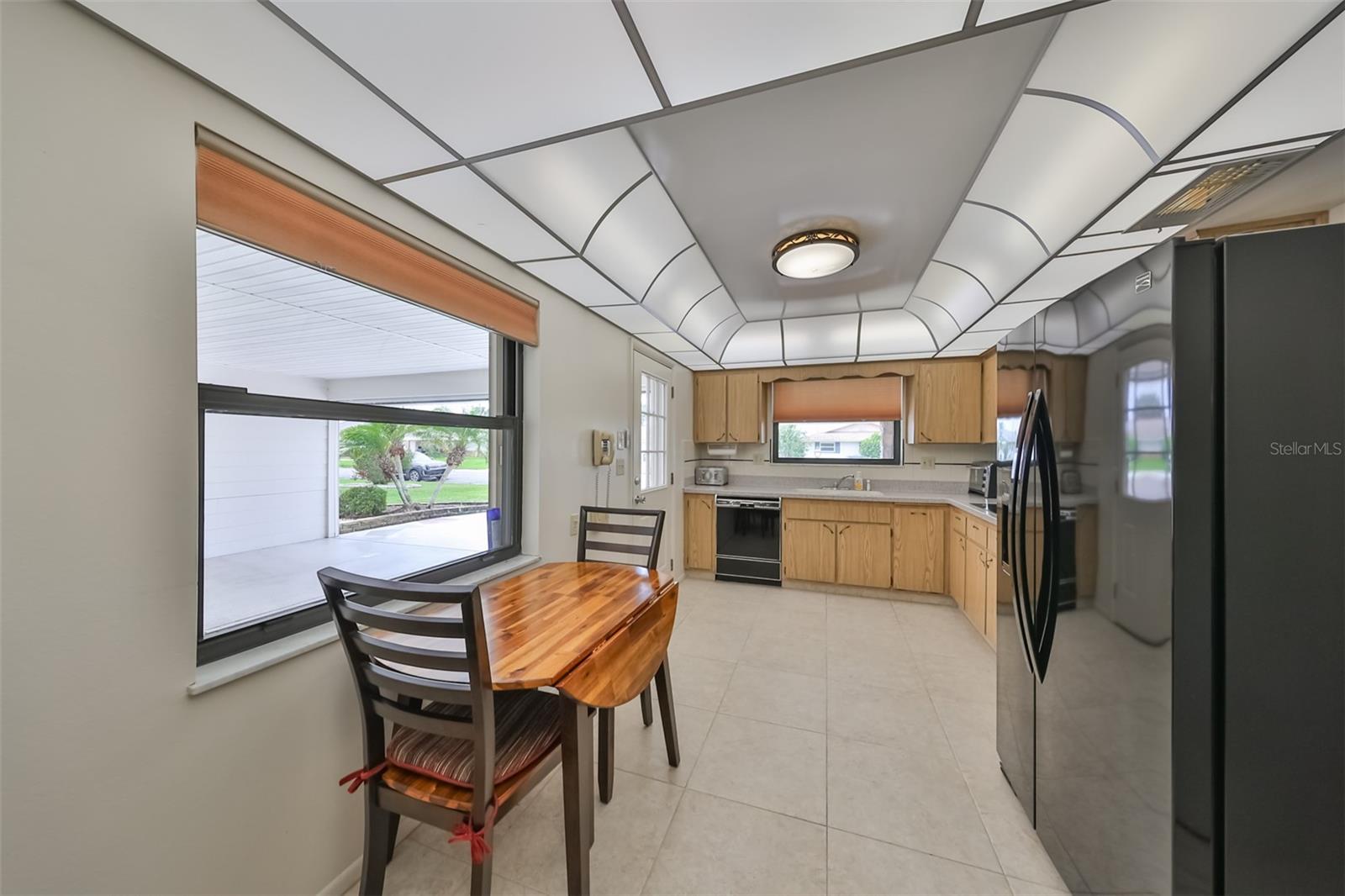 Kitchen is spacious, bright and handsome with the unique georgia style lighting.