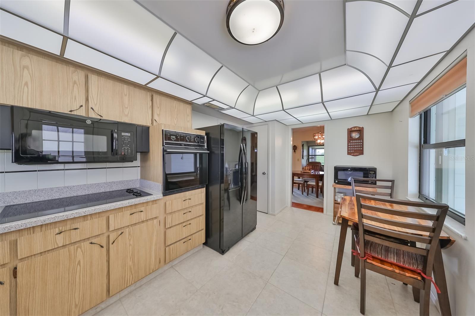 Kitchen is very good size with a large closet pantry on the other side of the refrigerator.