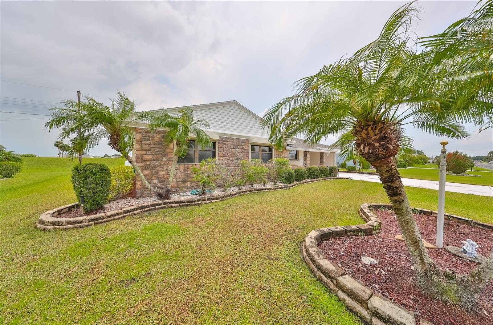 Custom curbing, easy maintenance landscaping and lots of space between the neighbors!