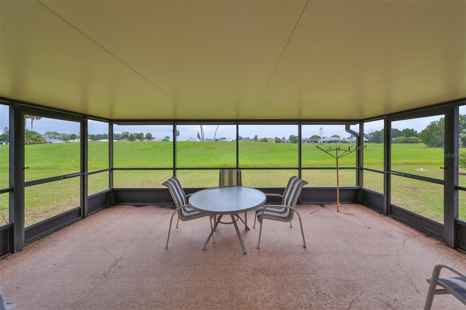 Screened lanai for watching the world go by and all of the privacy you could want.