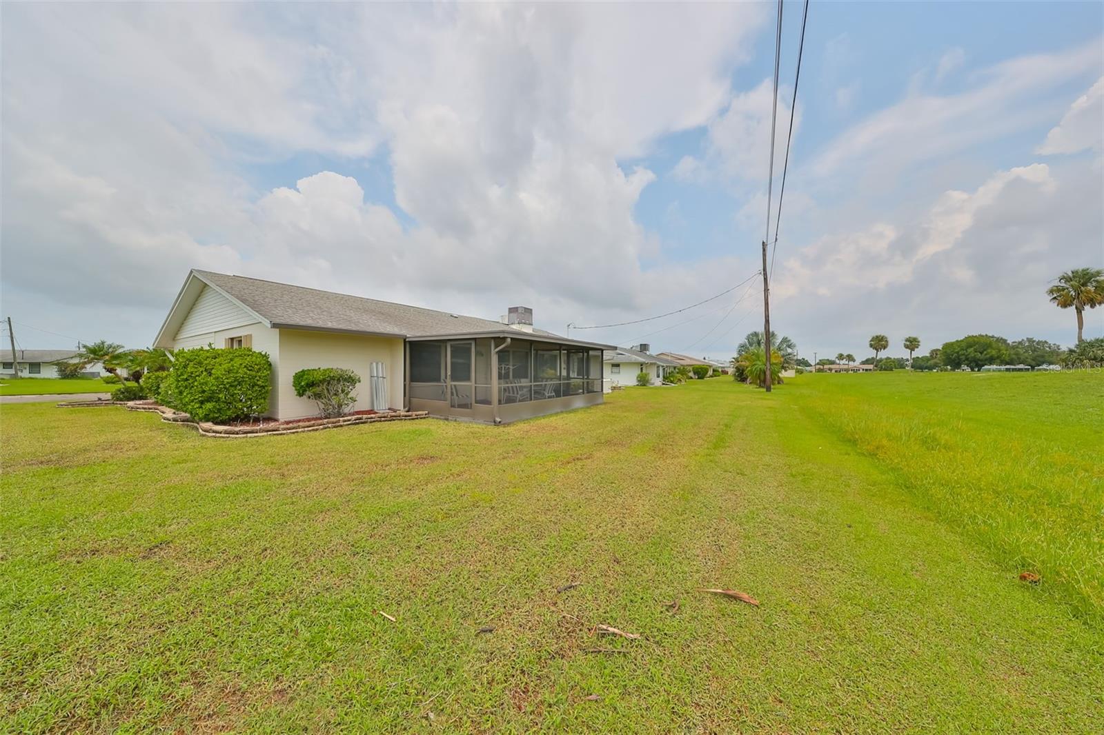 Lots of green space around the home, custom curbing and low maintenance landscaping.