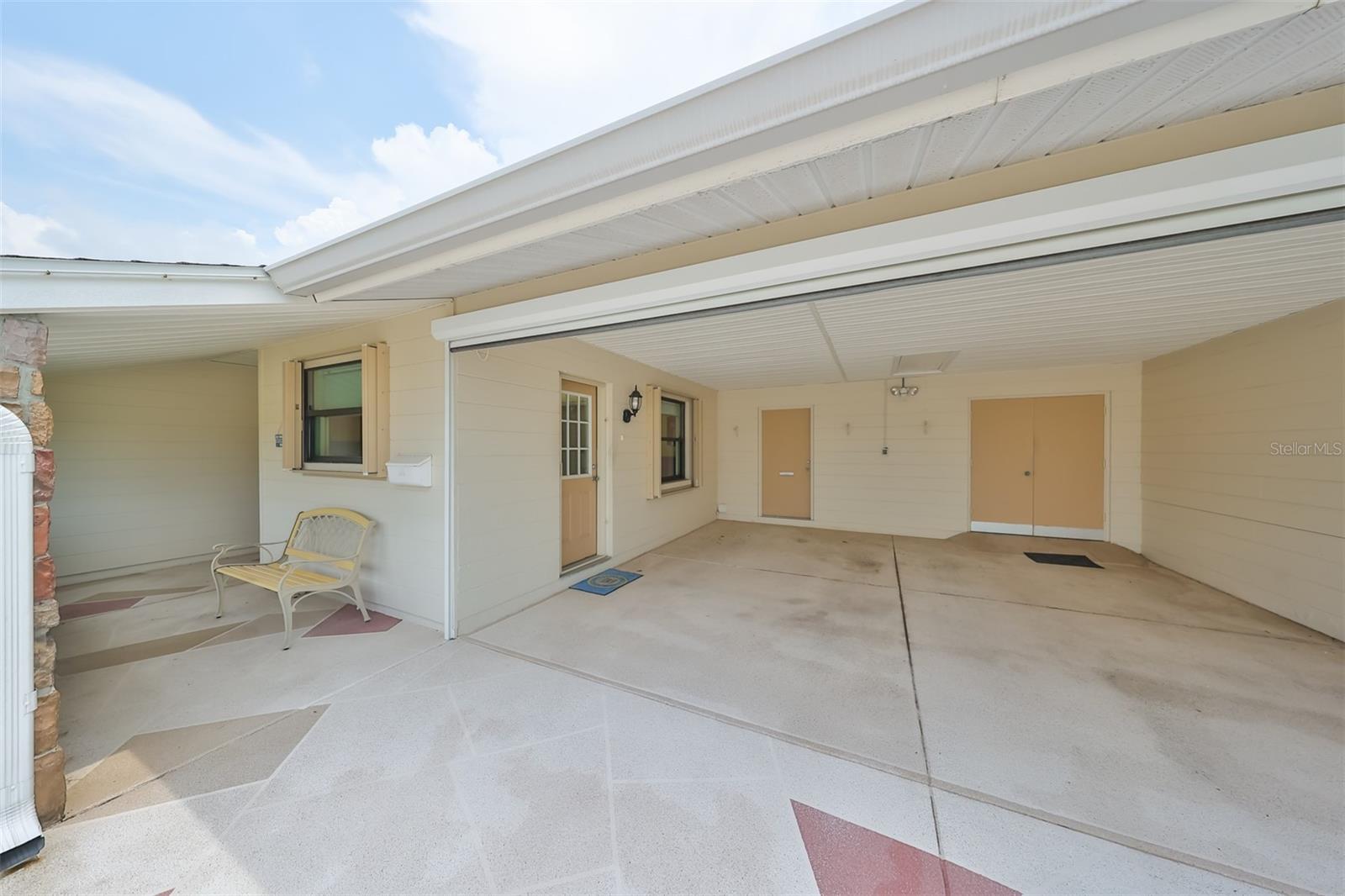 This home has gutters, front porch, hurricane shutters, a WHOLE house generator and carport privacy screen just to name a few of the enhancements of this home.