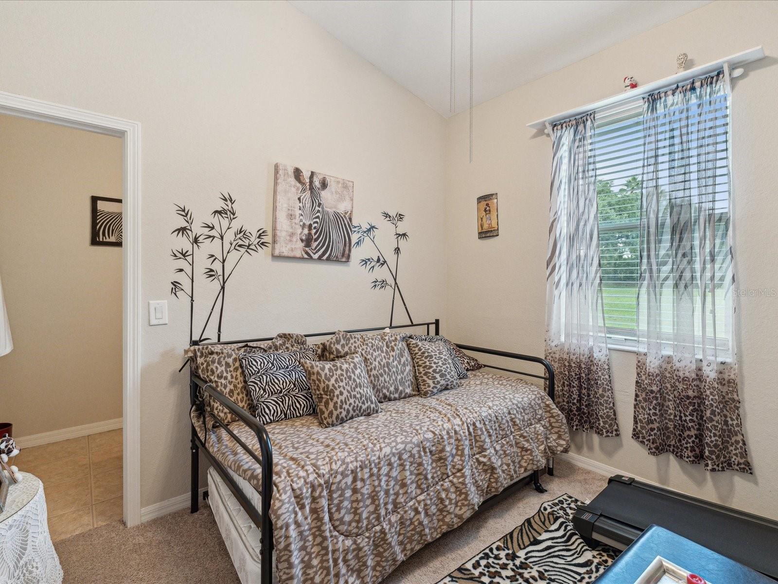 The third bedroom is the coziest of all the rooms and offers en-suite bathroom access as well vaulted ceilings that make this room seem bigger.