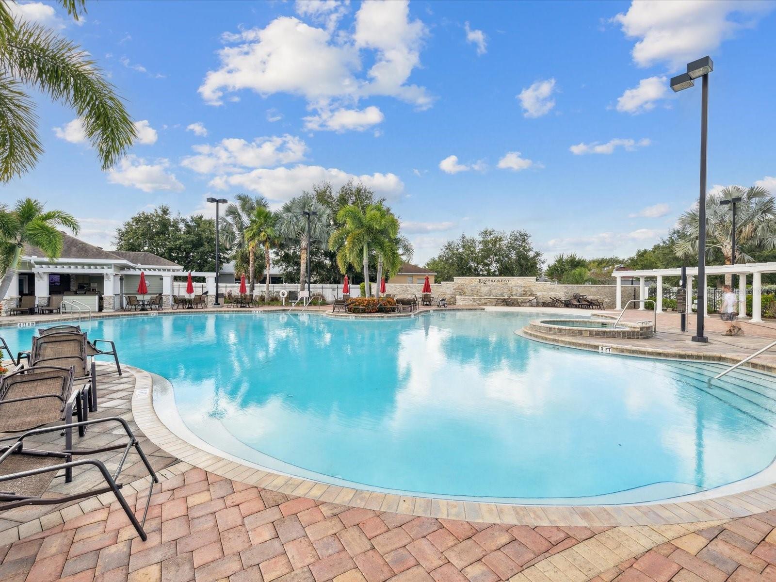 Lounge chairs and pergolas are waiting for you around the pool. Residents and guests must check in a secure entry that is only accessible with an access card.