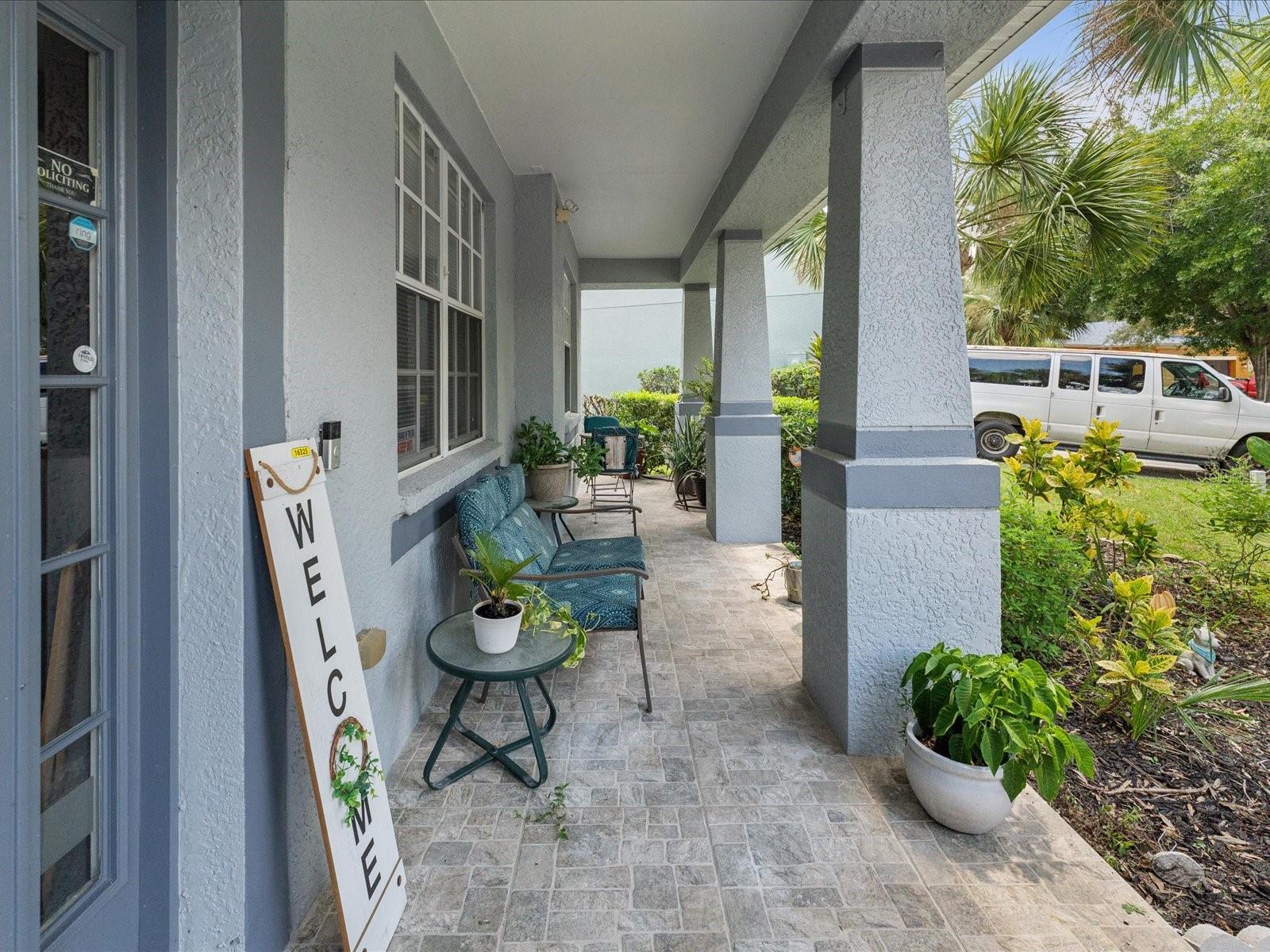 Enjoy quiet moments on the front porch as you savor neighborhood views and lush landscaping.