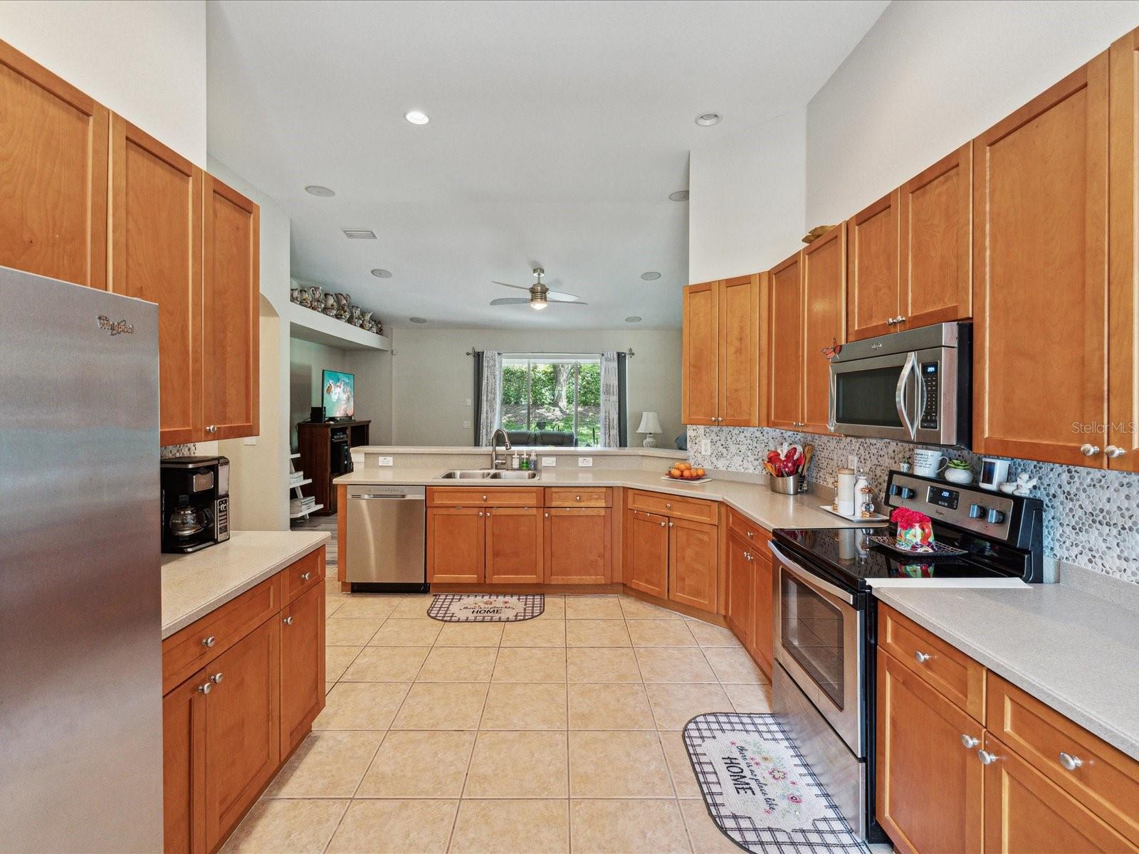 Whether you are throwing a party or having a quiet dinner, this kitchen has it all!