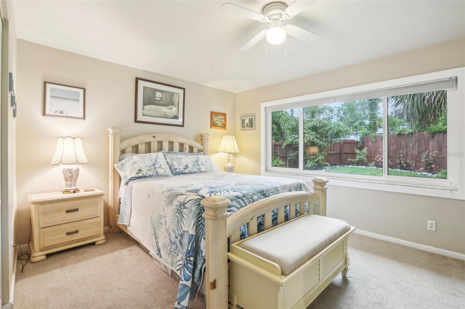 Primary Bedroom with garden views.