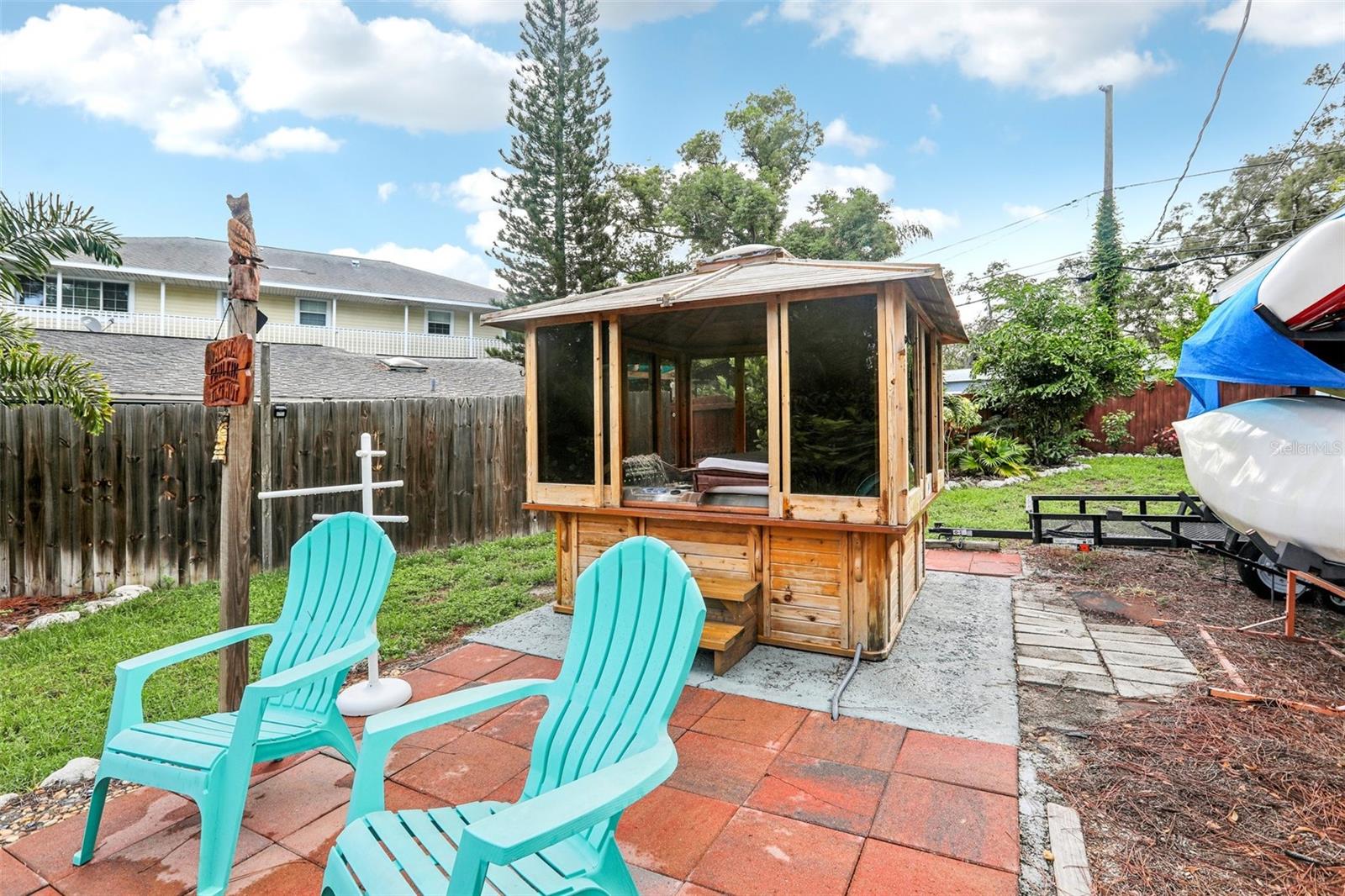 hot tub and gardens