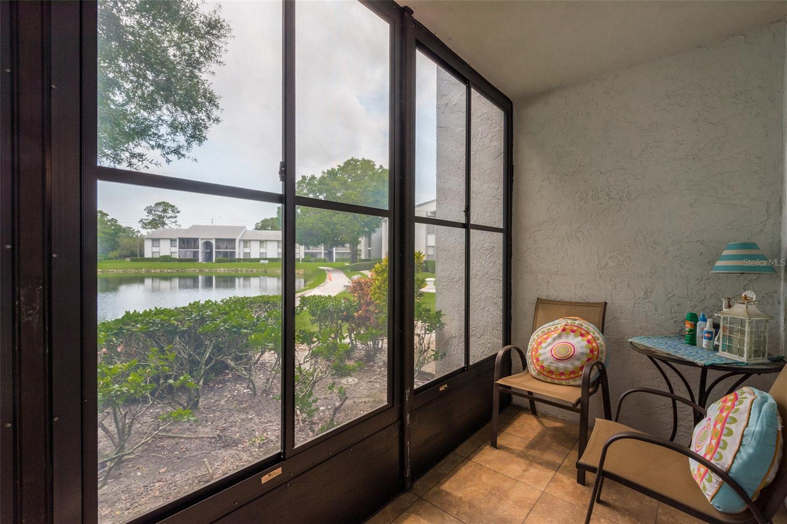 Screen porch with vinyl windows