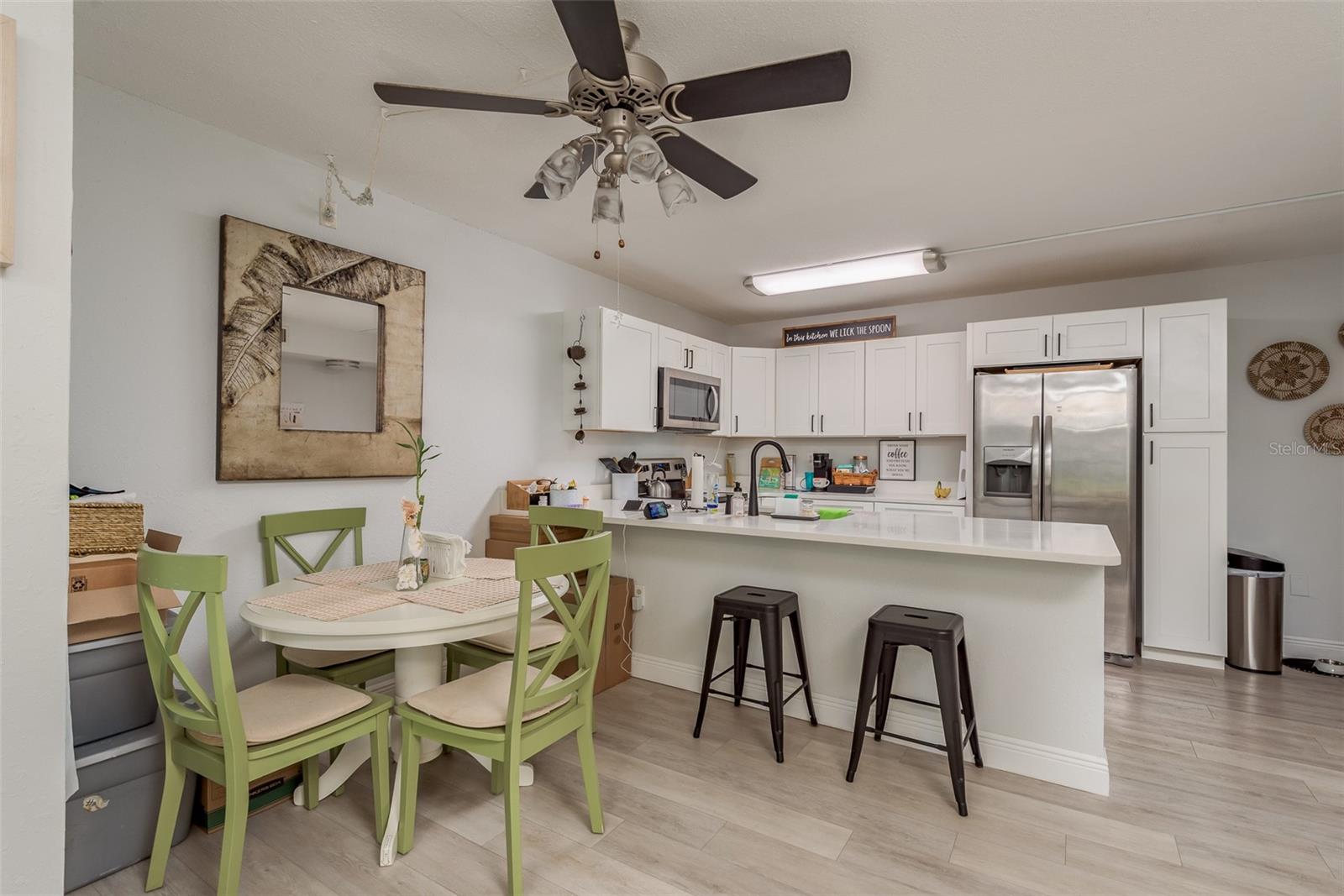 The wall closing off the kitchen was removed and the kitchen was all remodeled