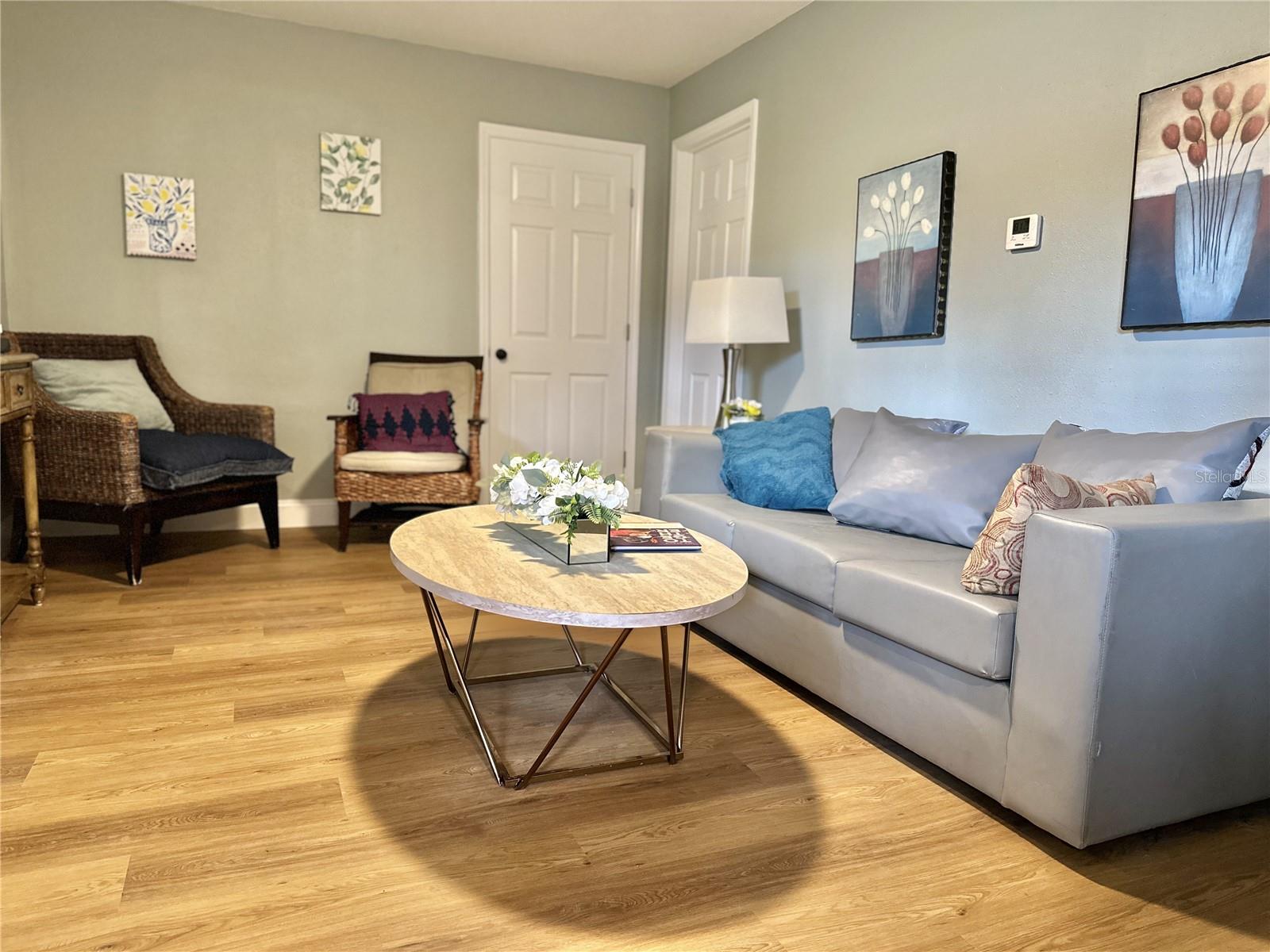 New Luxury Vinyl Plank flooring throughout home.