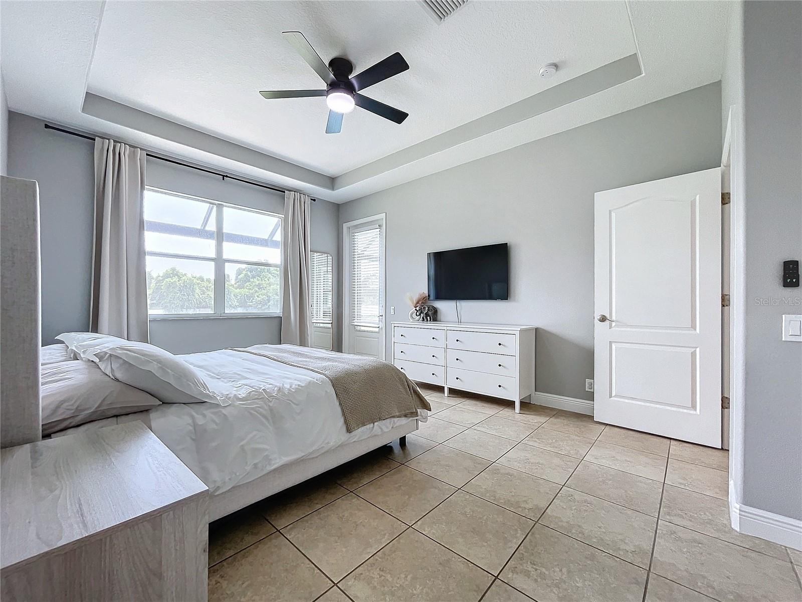 Primary Bedroom with tray ceilings