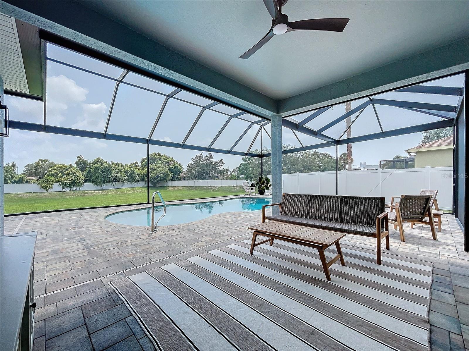 Covered patio + panoramic view pool cage screen