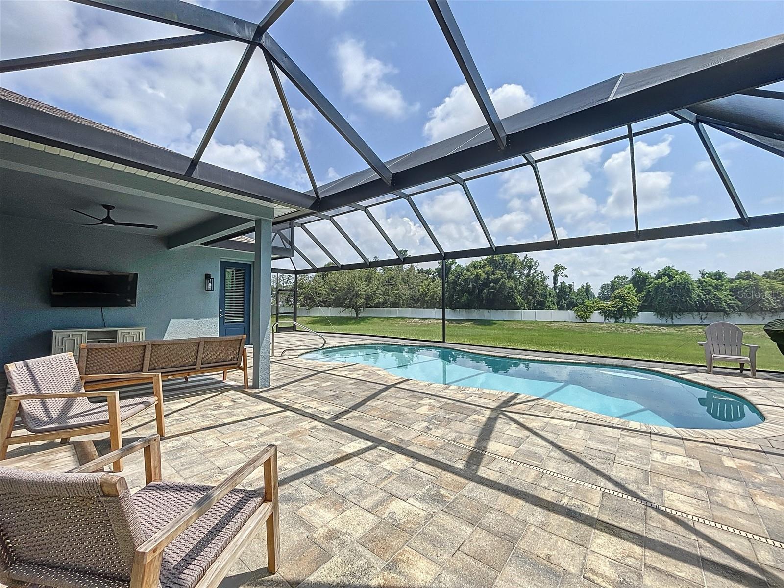 Covered patio + panoramic view pool cage screen