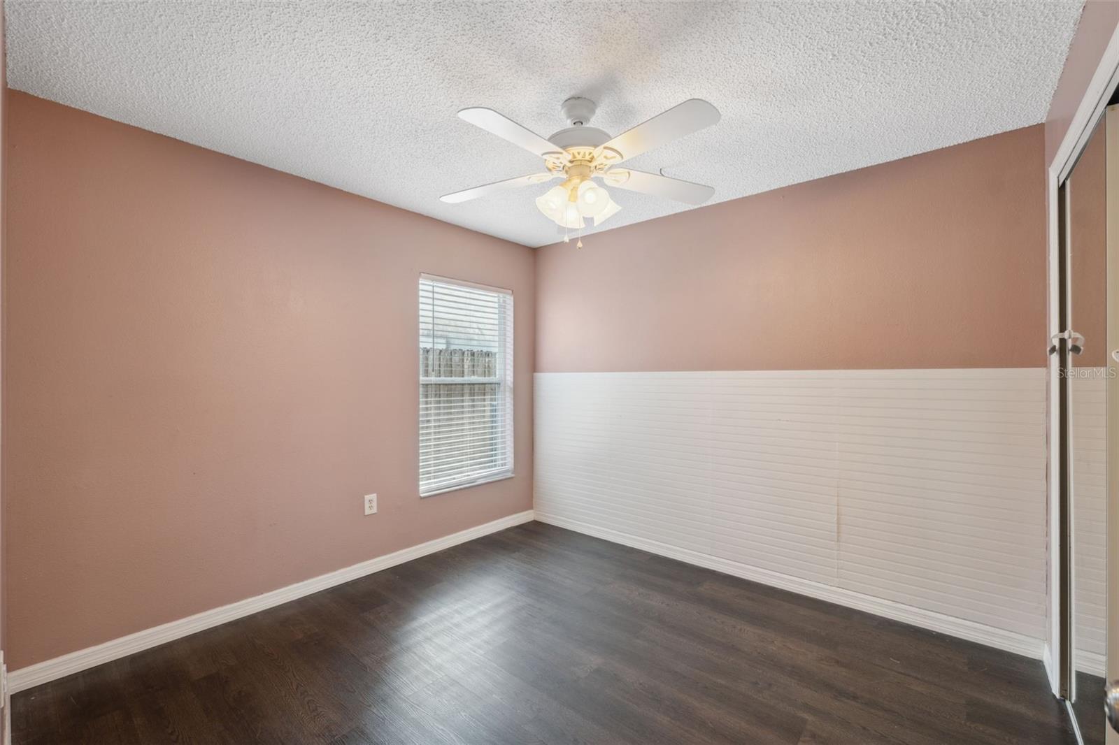 Walk through sliding glass door from the bonus room to the back patio.