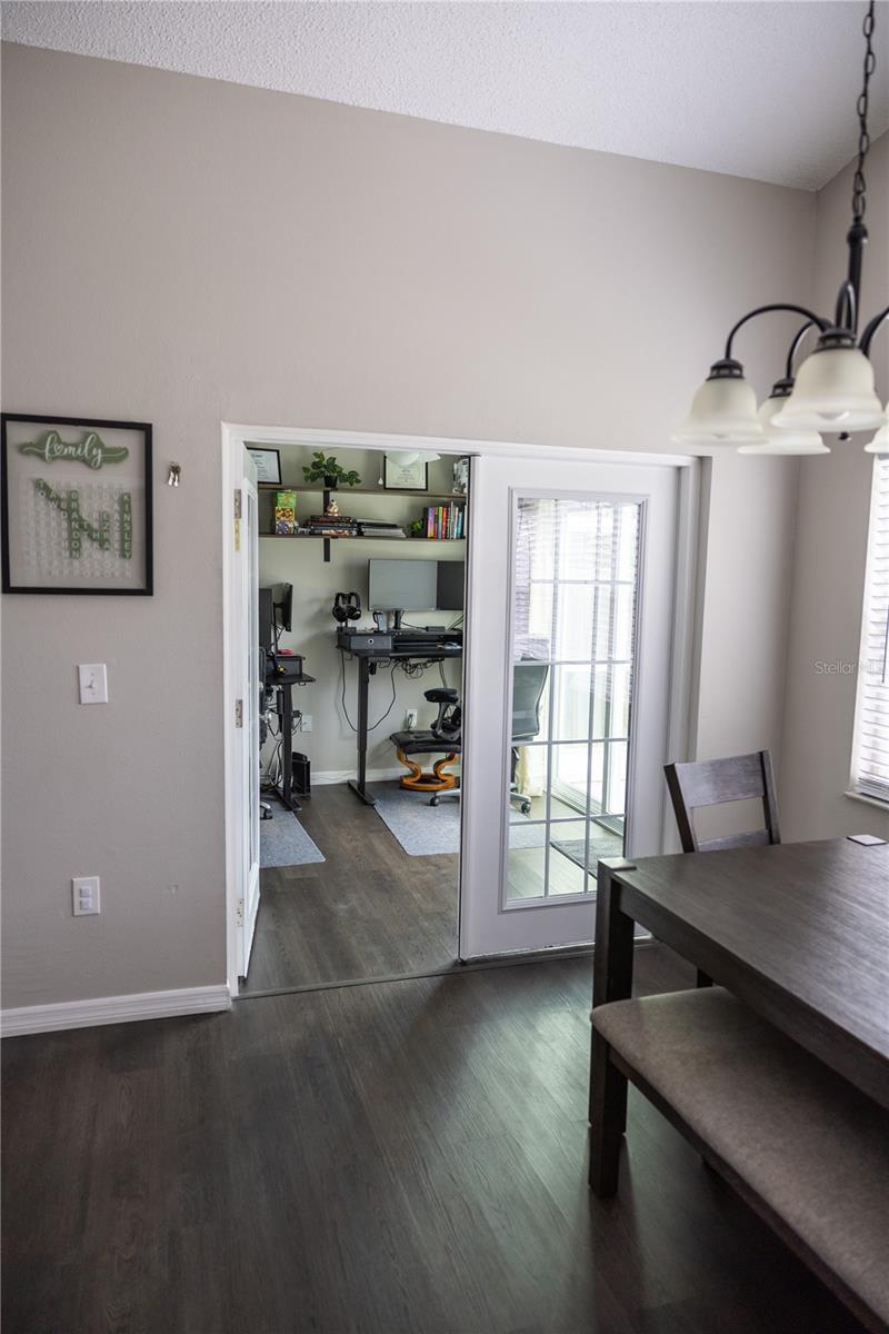 The added floating floor in bonus room with vinyl flooring