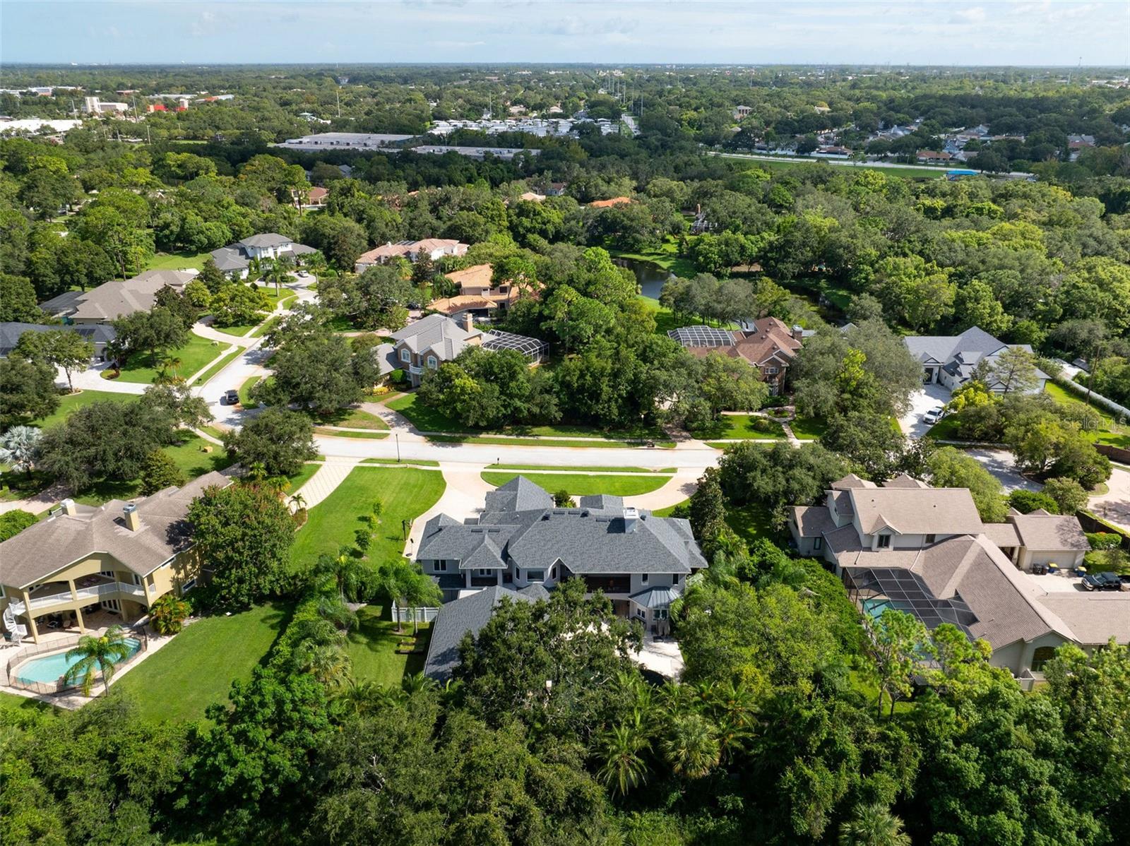 Drone view looking north of home and showing its small, private subdivision