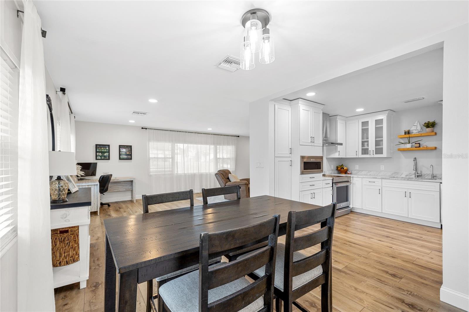 The Dining Room is big enough for a much larger dining table than the current owners use!