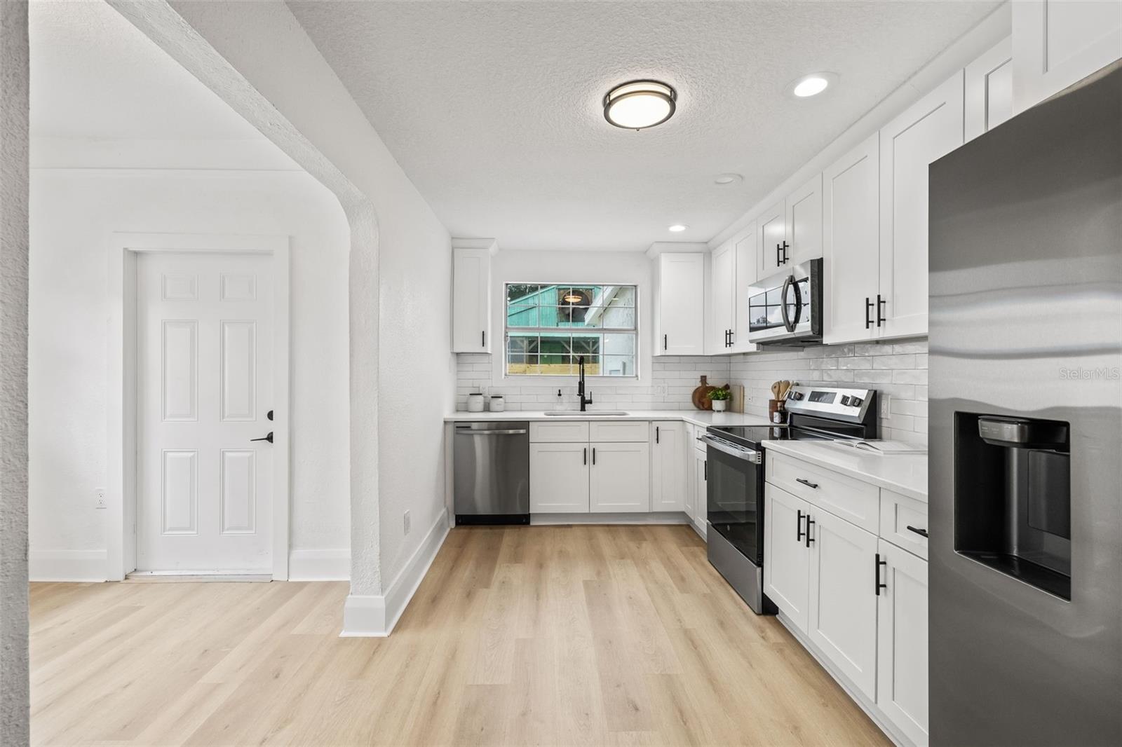 Kitchen with breakfast nook off the side.