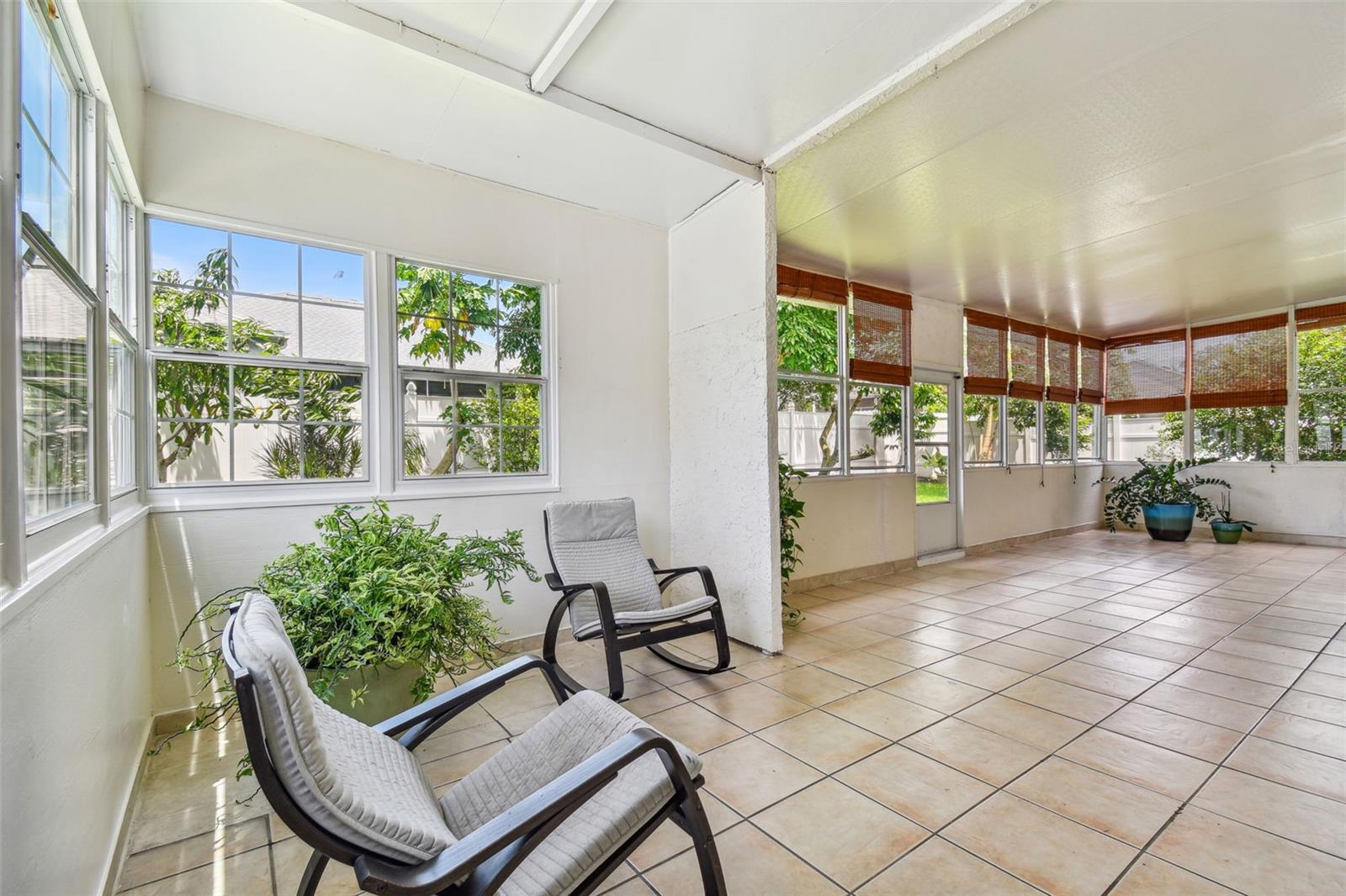 Sunroom with tile flooring