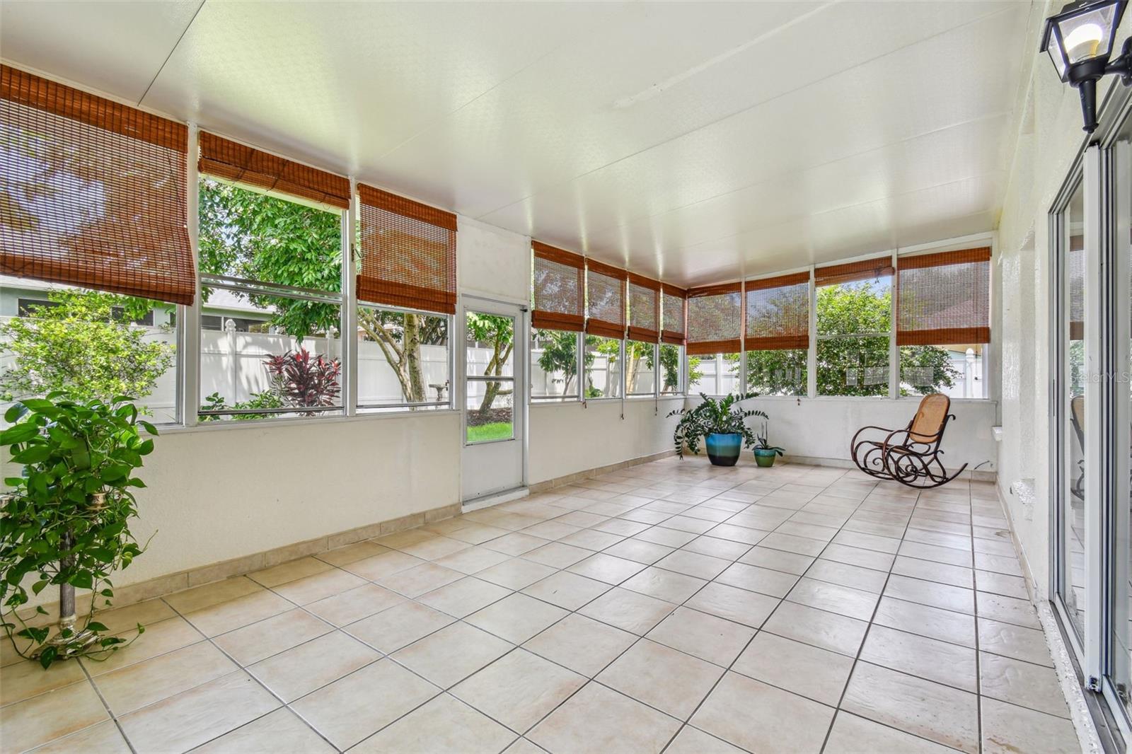 Sunroom with tile flooring