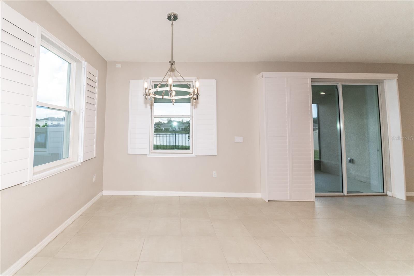 Dining Area and Sliding Doors to Covered Lanai