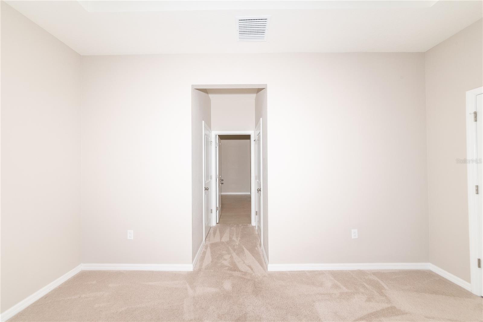 Master Bedroom with His and Her Closets