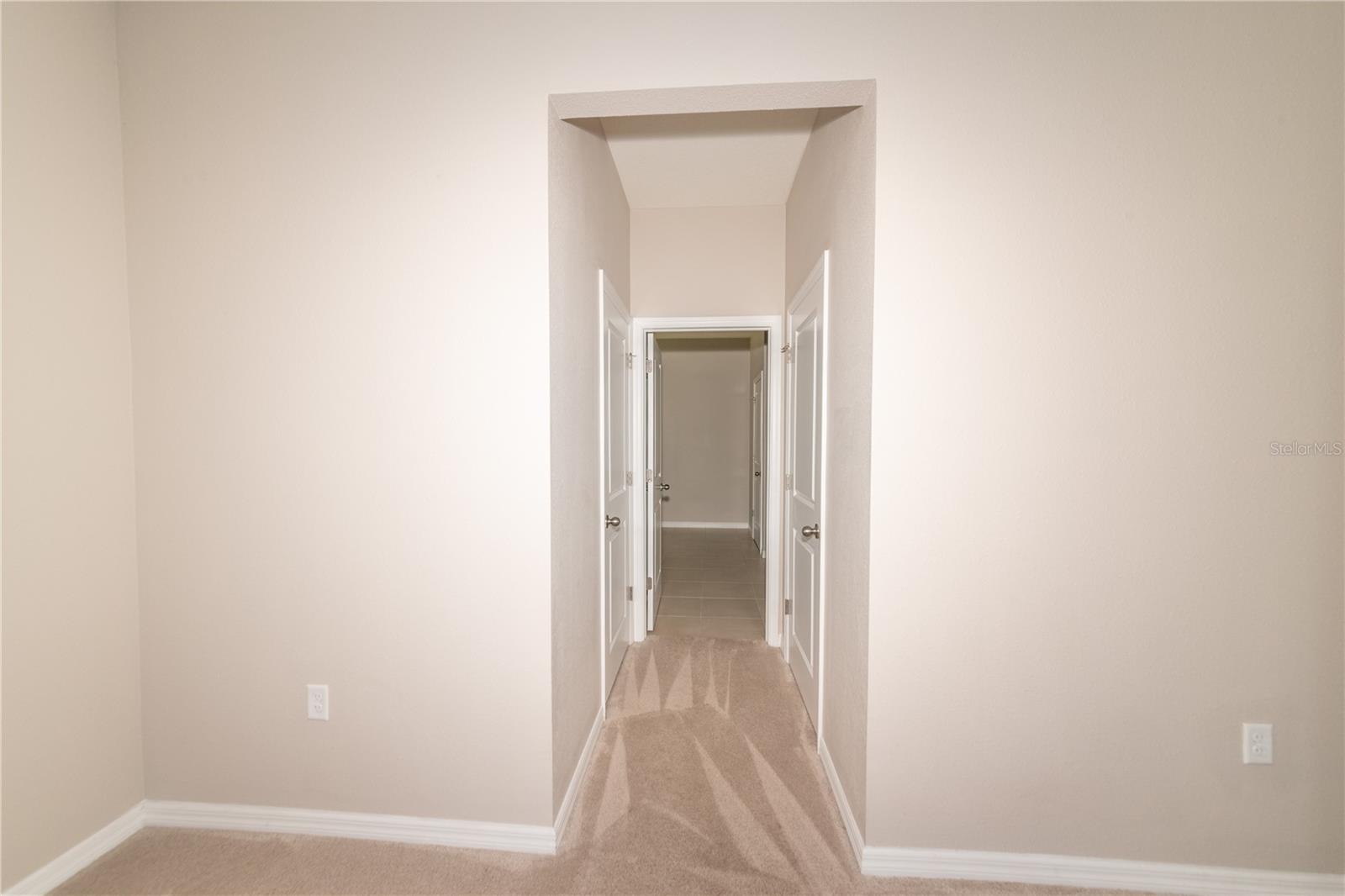 Master Bedroom and Entrance to Master Bathroom