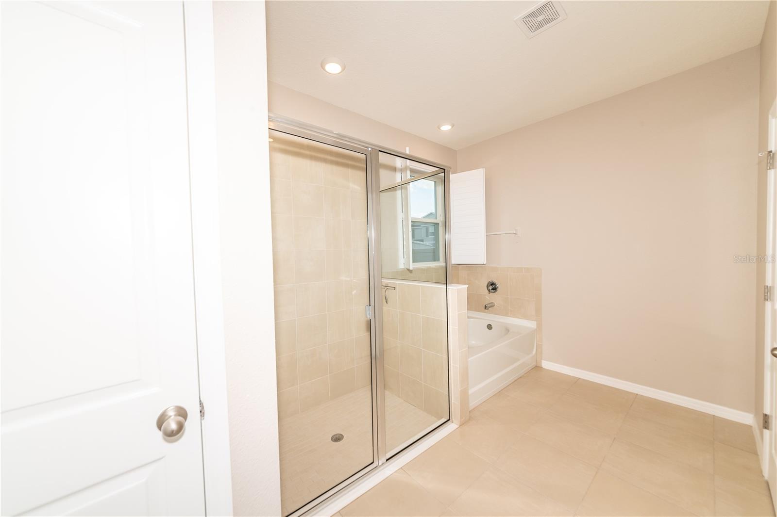 Master Bathroom with Shower and Garden Tub