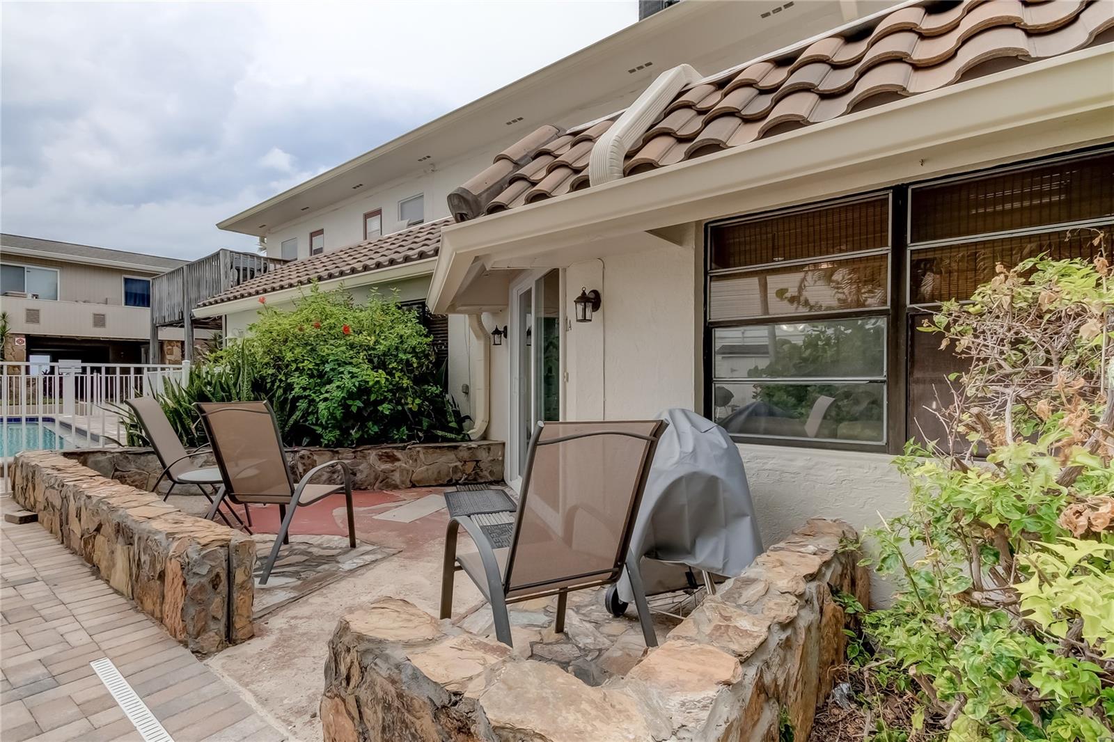 Patio W overlooks pool