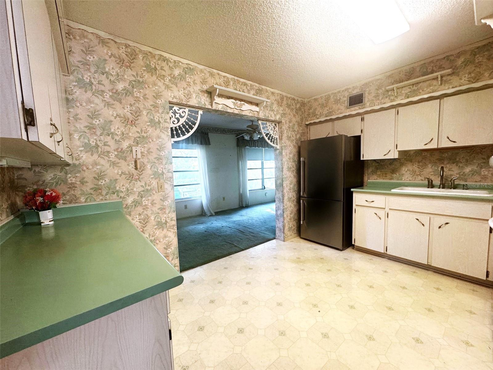 Kitchen w/Newer Appliances - Microwave, Refrigerator & Wall Oven