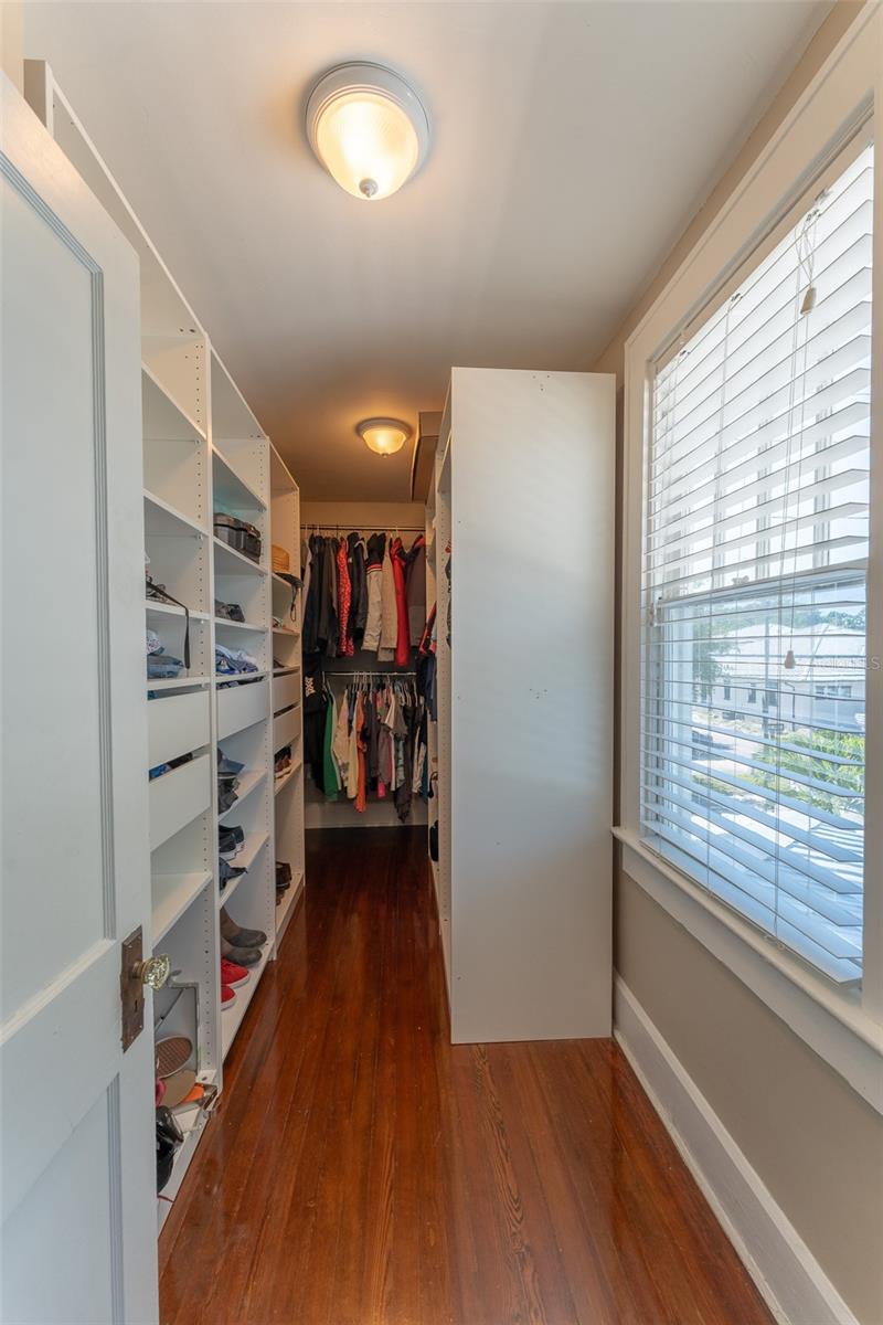 Primary bedroom large walk in closet.