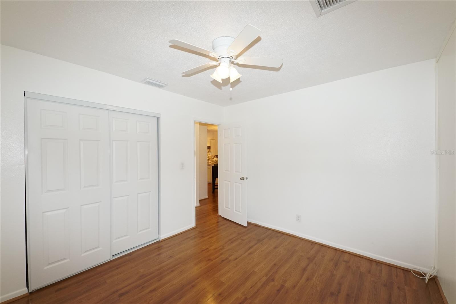 NEW INTERIOR ODORS ON CLOSET VISBIBLE IN THE FIRST BEDROOM