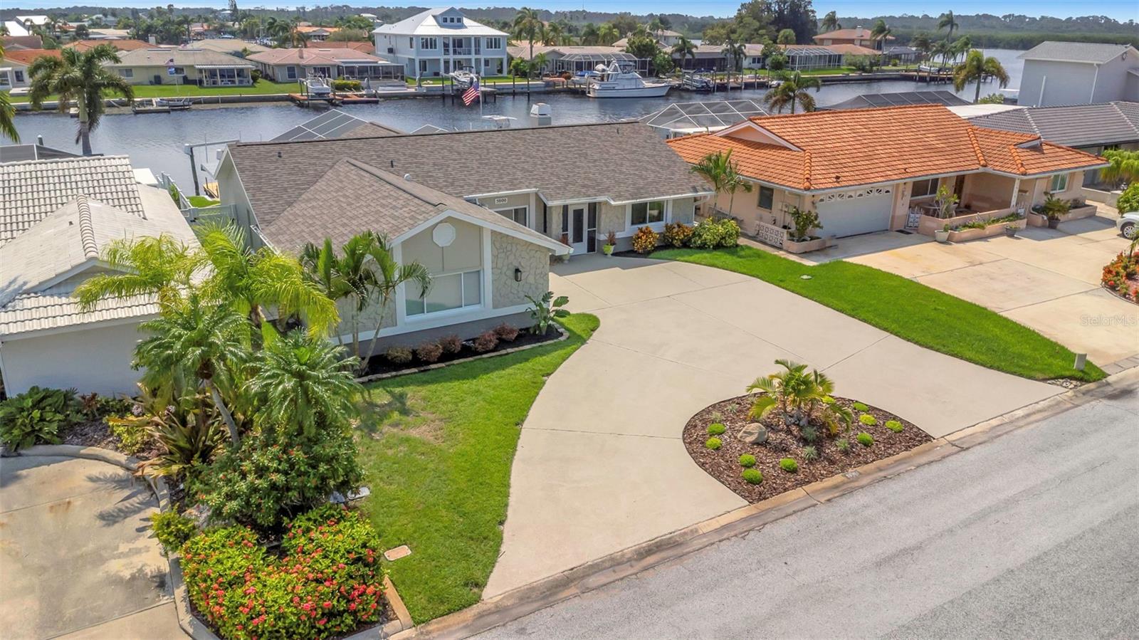 A Boating Enthusiast's Dream home on a deep-water canal!