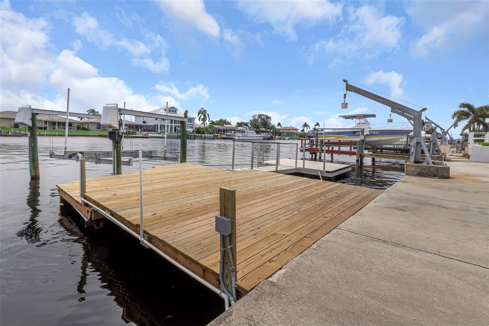 16'x22' dock with new wood decking (replaced in 2024).