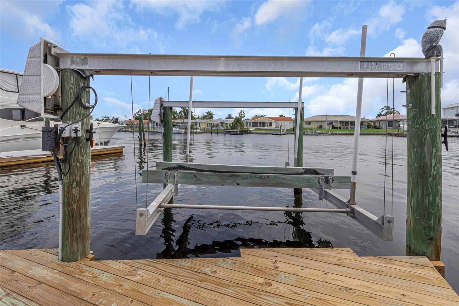 The dock includes a 10,000lb cradle boat lift.