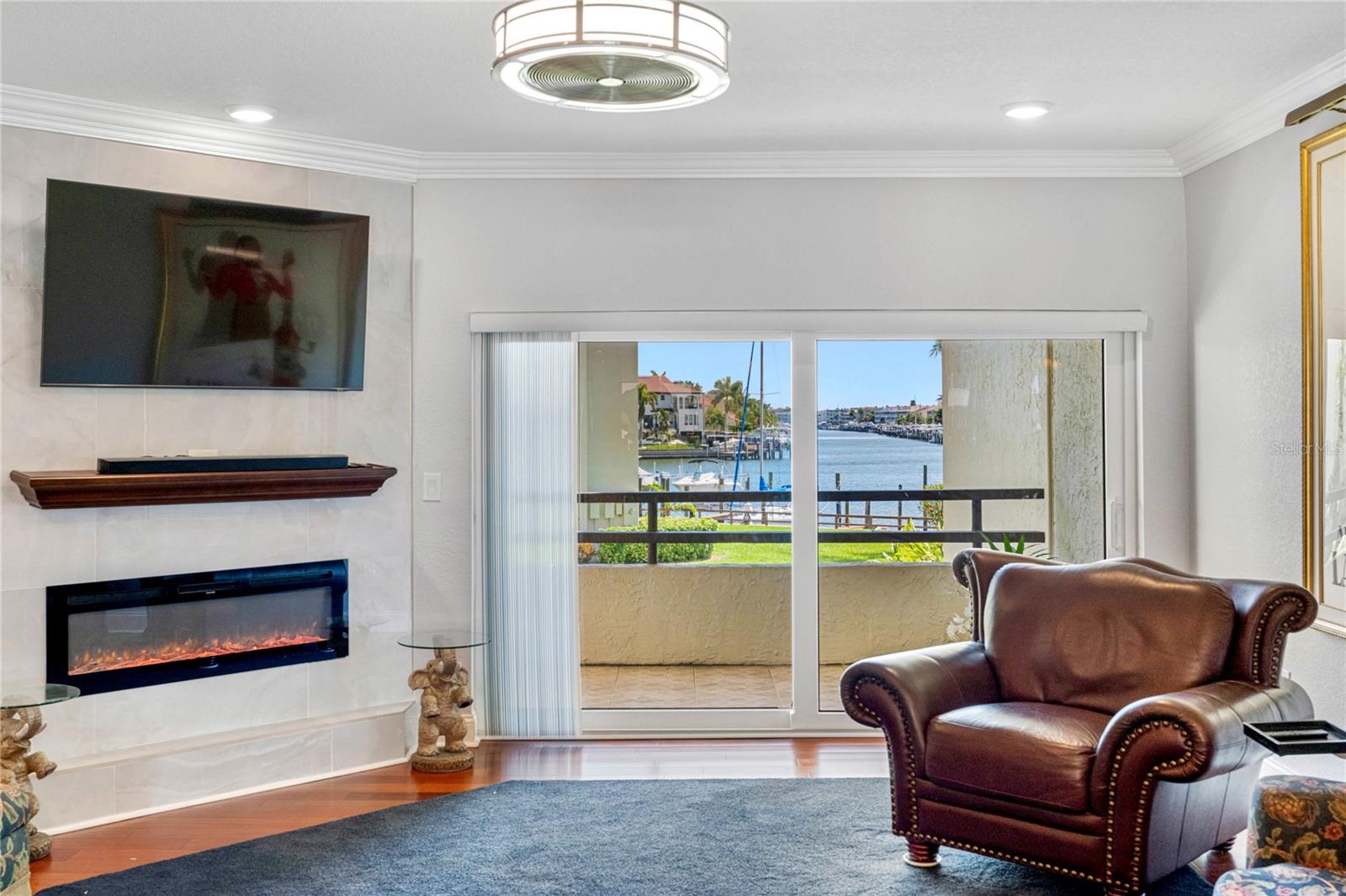 Living room with water views and impact sliders